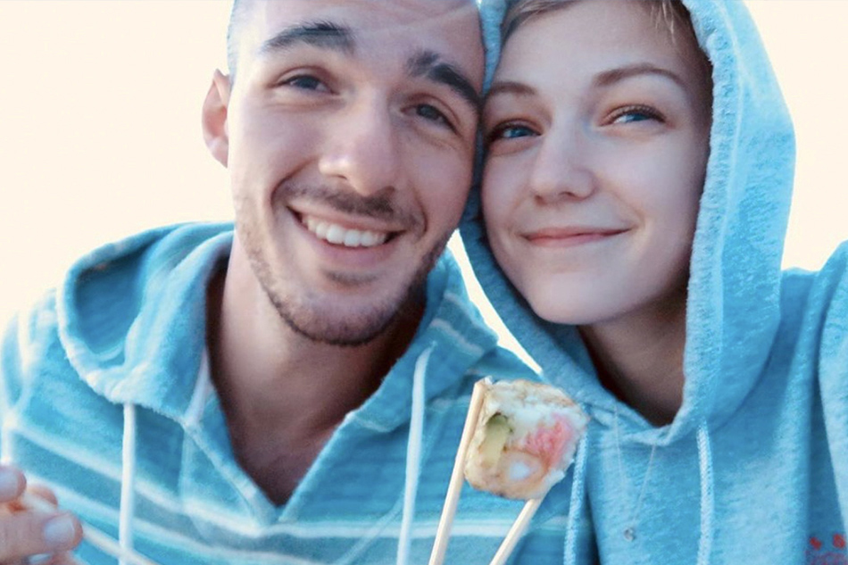 Gabrielle Petito, 22, who was reported missing on September 11, 2021 after traveling with her boyfriend around the country in a van and never returned home, poses for a photo with Brian Laundrie in this undated handout photo. North Port/Florida Police handout via Reuters/file