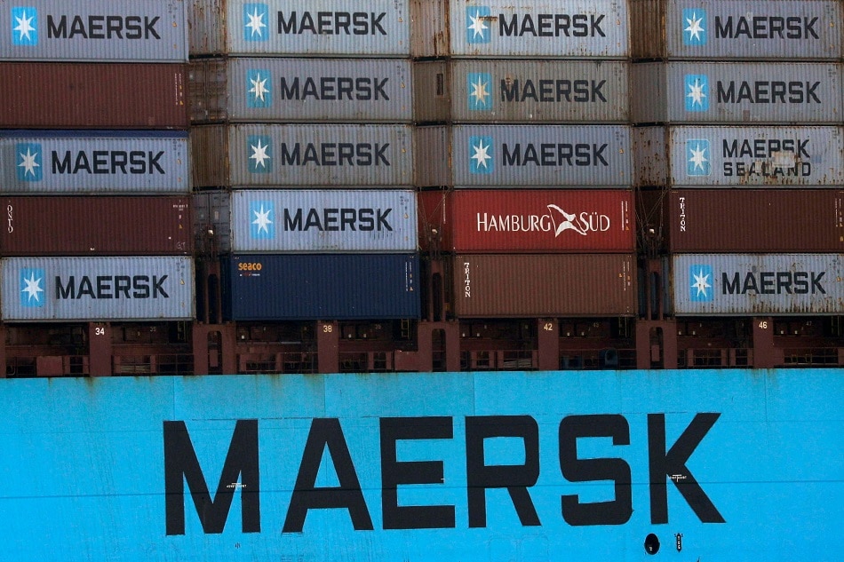 Shipping containers are transported on a Maersk Line vessel through the Suez Canal in Ismailia, Egypt July 7, 2021. Amr Abdallah Dalsh, Reuters/File