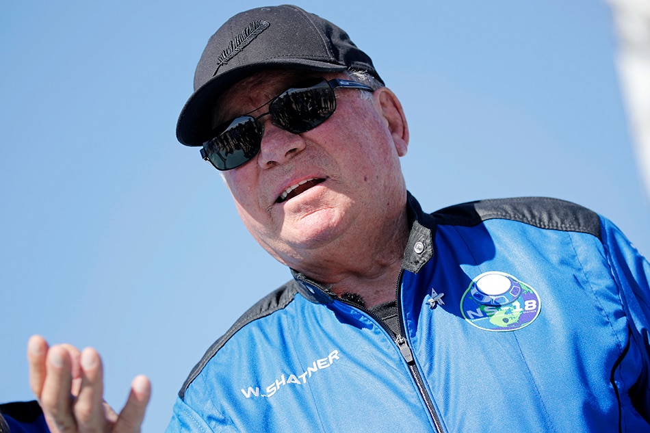 Star Trek actor William Shatner, 90, speaks to the news media after his flight with three others in a capsule powered by Blue Origin's reusable rocket engine New Shepard on a landing pad near Van Horn, Texas, U.S., October 13, 2021. Mike Blake, Reuters