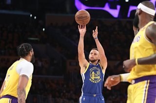 Curry's triple-double propels Warriors past Lakers
