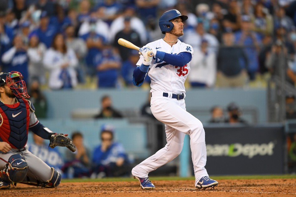 Los Angeles Dodgers first baseman Cody Bellinger (35) hits a three-run home run in the eighth inning of game three of the 2021 NLCS against the Atlanta Braves at Dodger Stadium. Jayne Kamin-Oncea, USA TODAY Sports/Reuters.