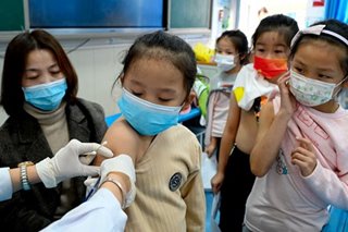 In China, the young start getting COVID-19 vaccines