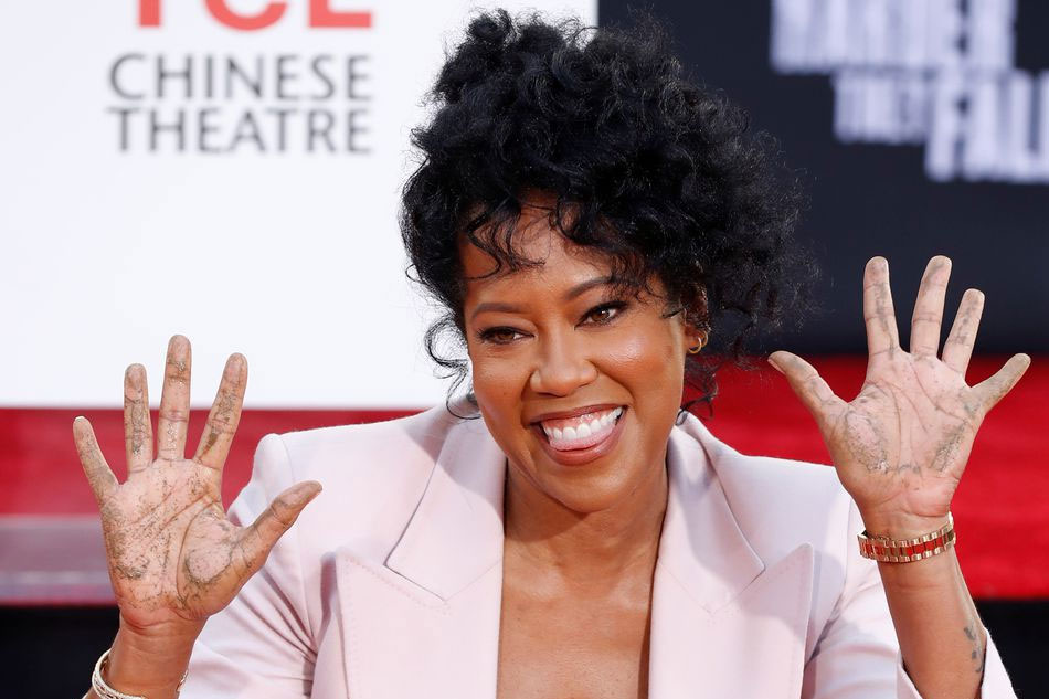 Regina King shows her hands after placing her handprints in cement during a ceremony in the forecourt of the TCL Chinese theatre in Los Angeles, California. Mario Anzuoni, Reuters