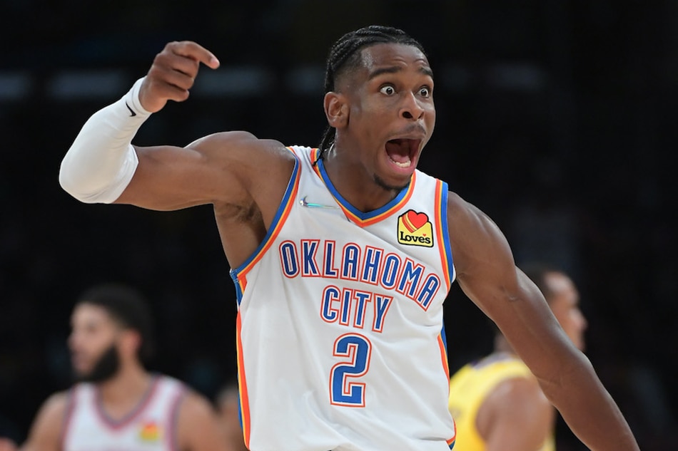 Oklahoma City Thunder guard Shai Gilgeous-Alexander (2) celebrates after a three-point basket against the Los Angeles Lakers at Staples Center. Jayne Kamin-Oncea, USA TODAY Sports/Reuters