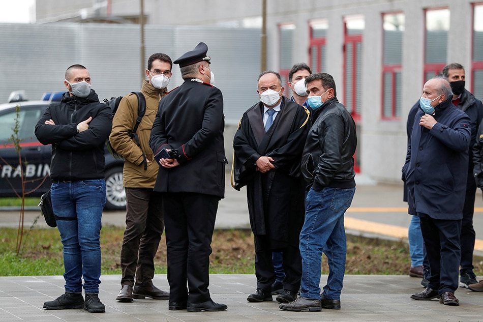 Prosecutor Nicola Gratteri stands outside during a pause in a trial against more than 320 suspected 'Ndrangheta mafia mobsters and their associates, accused of an array of charges, in Lamezia Terme, Italy, on January 13, 2021. Yara Nardi, Reuters/File Photo