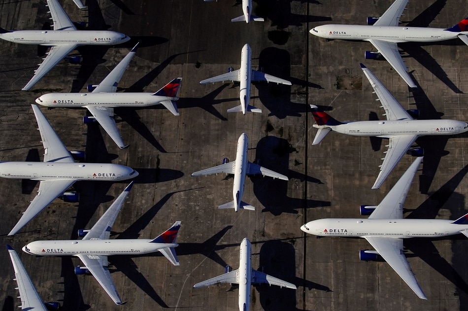Delta Air Lines passenger planes are seen parked due to flight reductions made to slow the spread of coronavirus disease (COVID-19), at Birmingham-Shuttlesworth International Airport in Birmingham, Alabama, US March 25, 2020. Elijah Nouvelage, Reuters/File