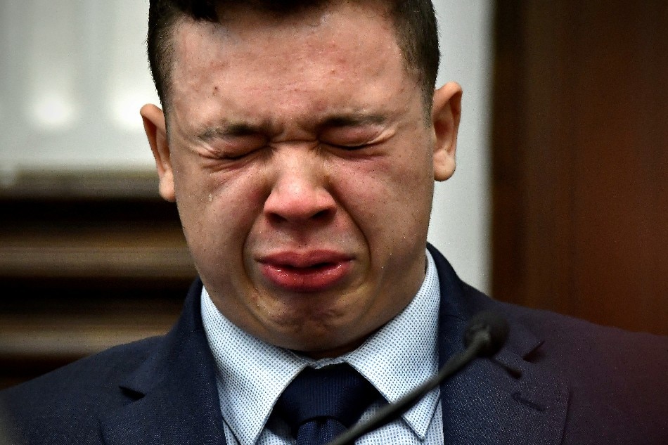 Kyle Rittenhouse breaks down on the stand as he testifies about his encounter with the late Joseph Rosenbaum during his trial at the Kenosha County Courthouse in Kenosha, Wisconsin, November 10, 2021. Sean Krajacic/Pool via Reuters/TPX IMAGES OF THE DAY
