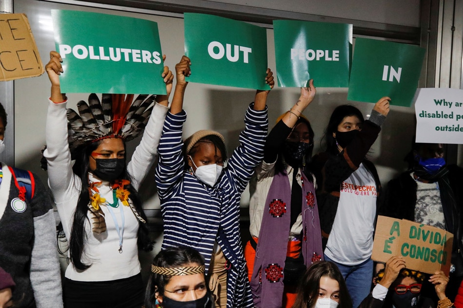 Climate activists protest during the UN Climate Change Conference (COP26) in Glasgow, Scotland, Britain, November 11, 2021. Phil Noble, Reuters.