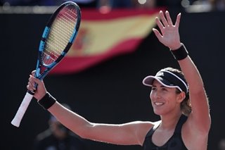 Muguruza wins all-Spanish clash at WTA Finals