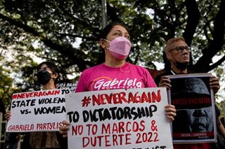 Activists protest to mark Marcos burial anniversary