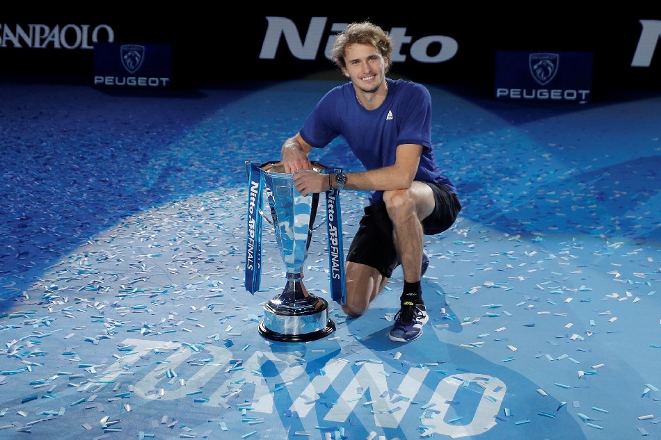 Daniil Medvedev of Russia, right, poses after winning the final