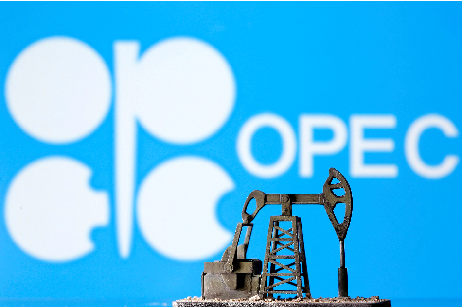 A 3D printed oil pump jack is seen in front of displayed Opec logo in this illustration picture, April 14, 2020. Dado Ruvic, Reuters/Illustration/File Photo