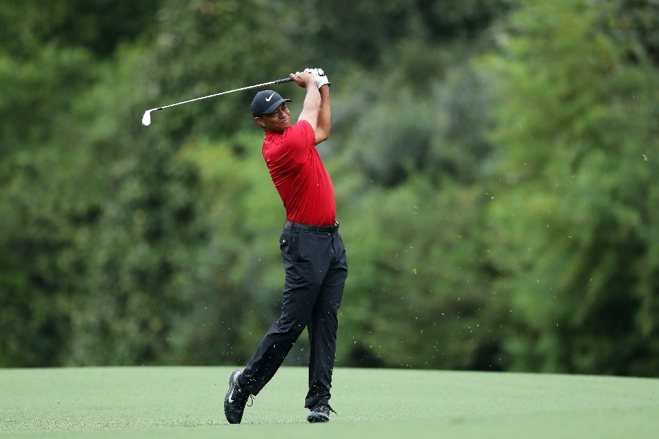 Tiger Woods of the United States plays an approach on the fifth hole during the final round of the Masters at Augusta National Golf Club on April 14, 2019 in Augusta, Georgia. File phoyo. David Cannon, Getty Images/AFP