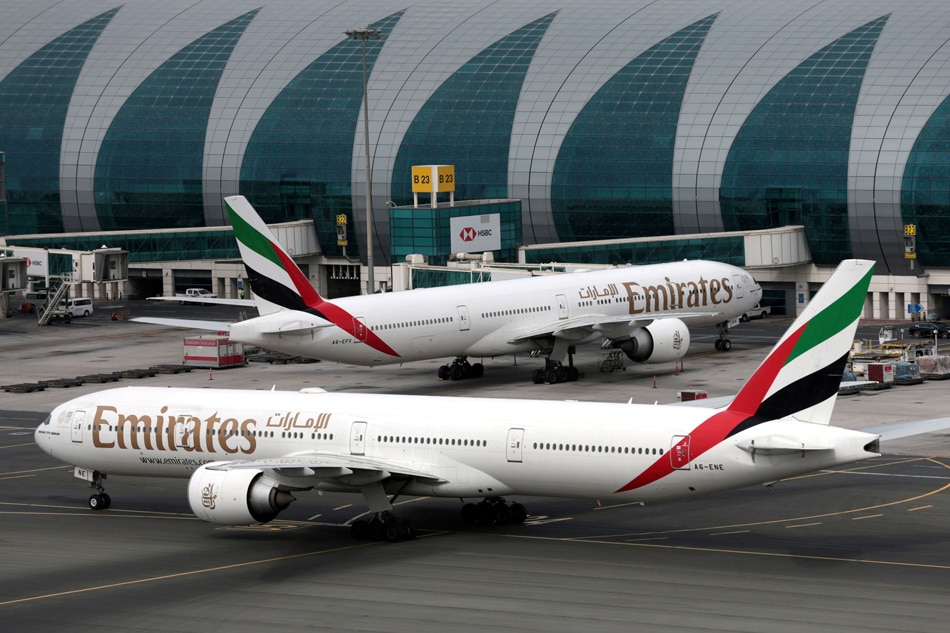  Emirates Airline Boeing 777-300ER planes are seen at Dubai International Airport in Dubai, United Arab Emirates, February 15, 2019. REUTERS/Christopher Pike/File Photo/File Photo