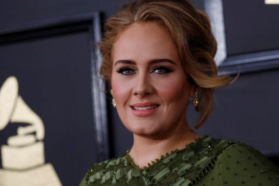 FILE PHOTO: Singer Adele arrives at the 59th Annual Grammy Awards in Los Angeles, California, U.S. , February 12, 2017. REUTERS/Mario Anzuoni