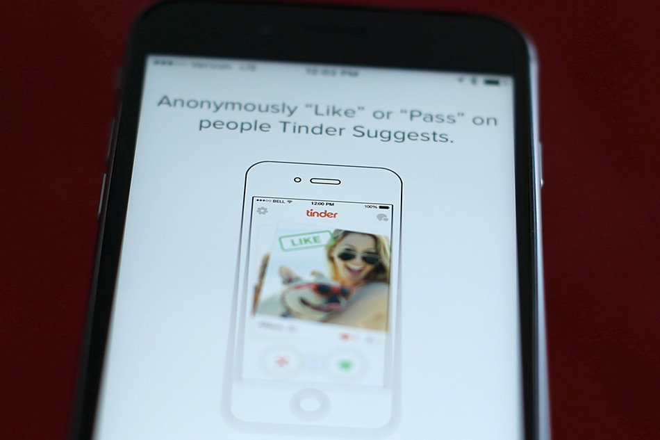 The dating app Tinder is shown on an Apple iPhone in this photo illustration taken February 10, 2016. Just in time for Valentine's Day, a survey shows that more Americans are looking for love through online dating, with more than four times as many young adults using mobile apps than in 2013. Mike Blake, Reuters/Illustration/File Photo