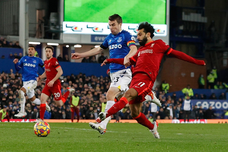 Liverpool's Mohamed Salah scores their third goal. Phil Noble, Reuters