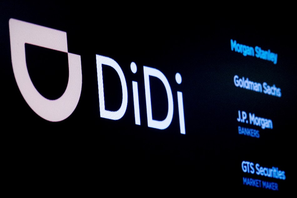 The logo for Chinese ride-hailing company Didi Global Inc is pictured at the New York Stock Exchange (NYSE) floor in New York City, U.S., June 30, 2021. Brendan McDermid, Reuters/File