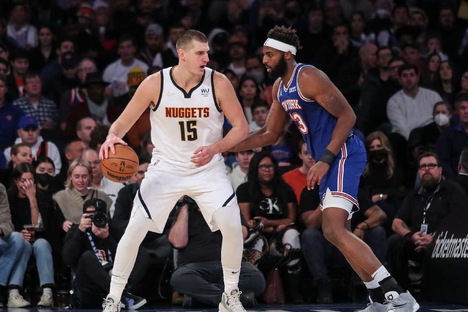 Denver Nuggets center Nikola Jokic (15) looks to post up against New York Knicks center Mitchell Robinson (23) in the third quarter at Madison Square Garden. Wendell Cruz, USA TODAY Sports/Reuters