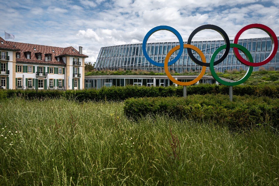 A picture taken on June 8, 2020 shows the Olympic rings logo in front of the headquarters of the International Olympic Committee (IOC) in Lausanne. Fabrice Coffrini, AFP/file