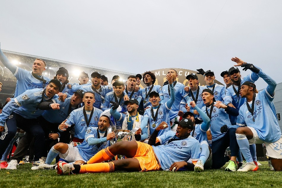 Members of the New York City FC celebrate with the MLS Cup after defeating the Portland Timbers in the 2021 MLS Cup championship game at Providence Park. Jaime Valdez, USA TODAY Sports/Reuters