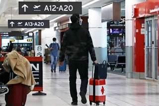 Canadians told not to travel abroad amid omicron fears