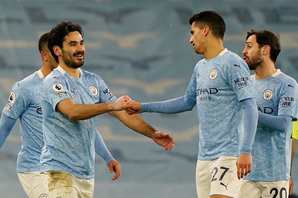 Football: Man City extend lead to 7 points, Liverpool stunned by Leicester 1