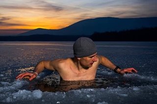 Swimming: Czech free-diver breaks ice-swim world record