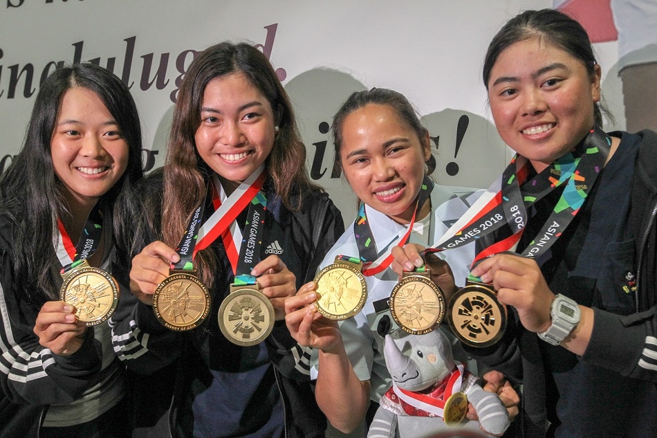 IN PHOTOS: From debuting Olympian in 2008, Hidilyn finally reaches mountaintop 7
