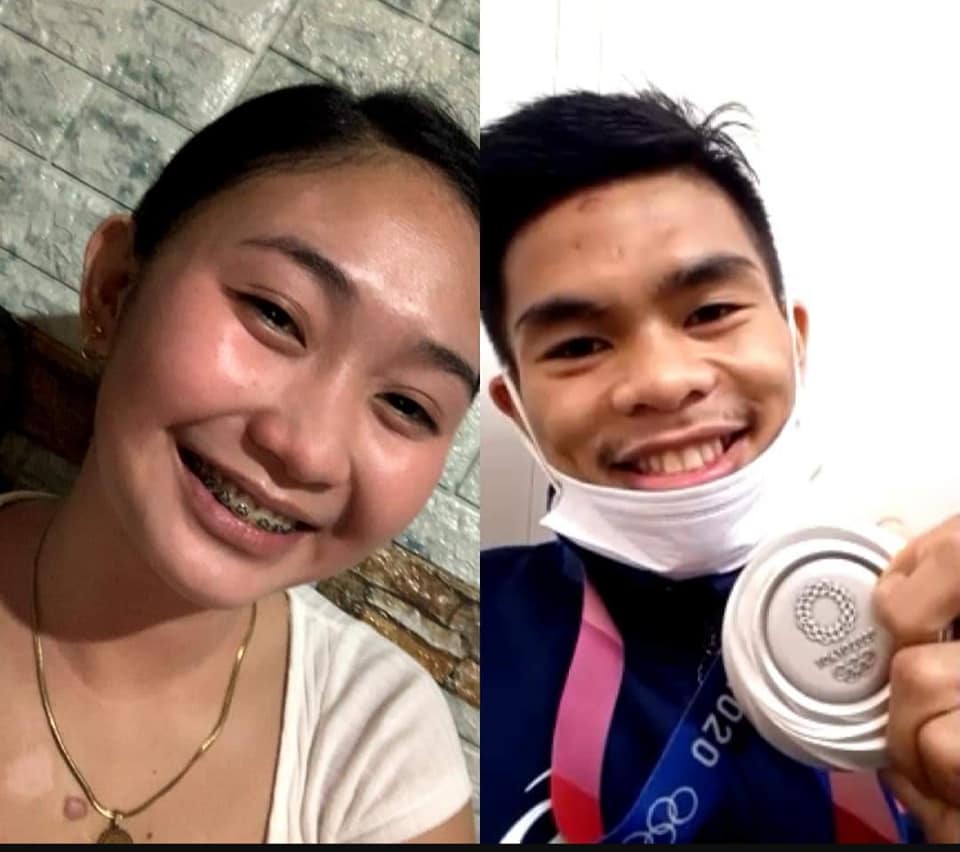 Si Carlo Paalam habang ipinakikita ang kanyang silver medal sa GF na si Stephanie Sepulveda. 