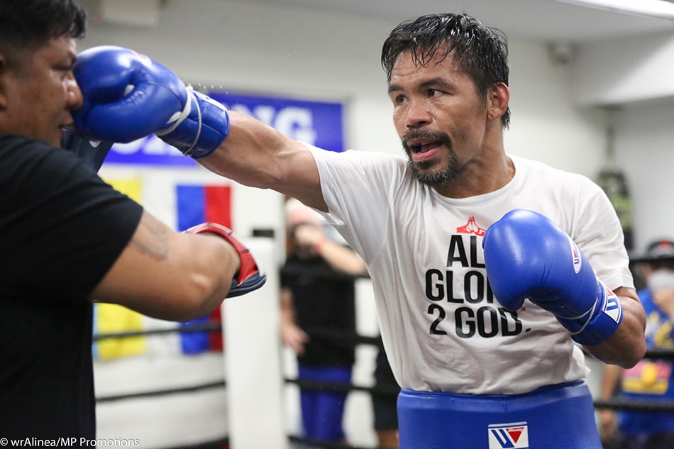 Manny Pacquiao will try to get the 'super' WBA welterweight title from Yordenis Ugás on August 21. Wendell Alinea