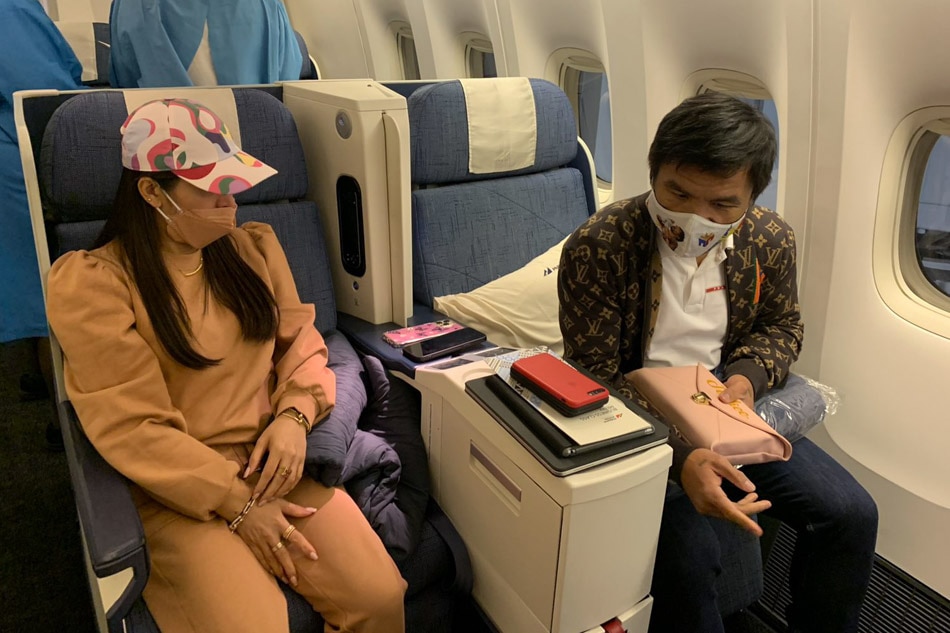 Senator Manny Pacquiao and wife Jinkee aboard PAL's PR 103 flight from Los Angeles, California bound for Manila on Aug. 29, 2021 (Manila time). 