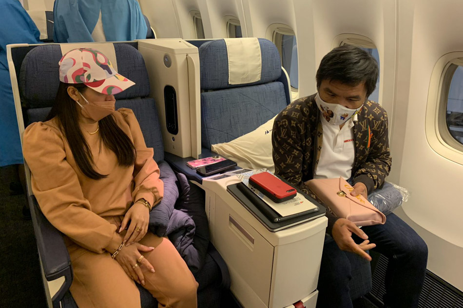 Senator Manny Pacquiao and wife Jinkee aboard PAL's PR 103 flight from Los Angeles, California bound for Manila on Aug. 29, 2021 (Manila time).
