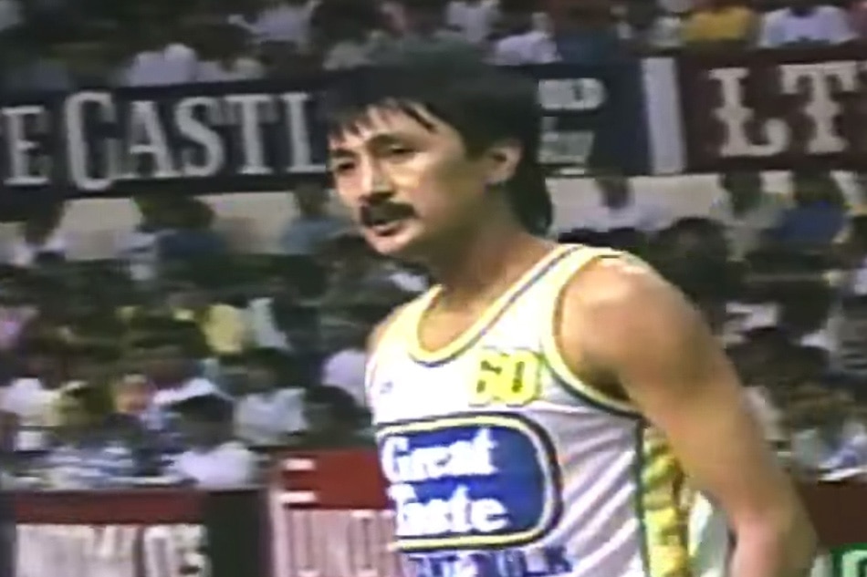 In this screen grab of a PBA game between Great Taste and Ginebra on November 24, 1987, Atoy Co talks to the referee after a call. PBA Official