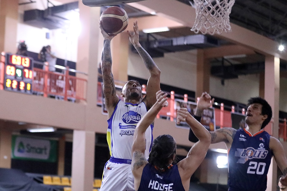 Magnolia's Calvin Abueva goes up for a shot against Meralco.