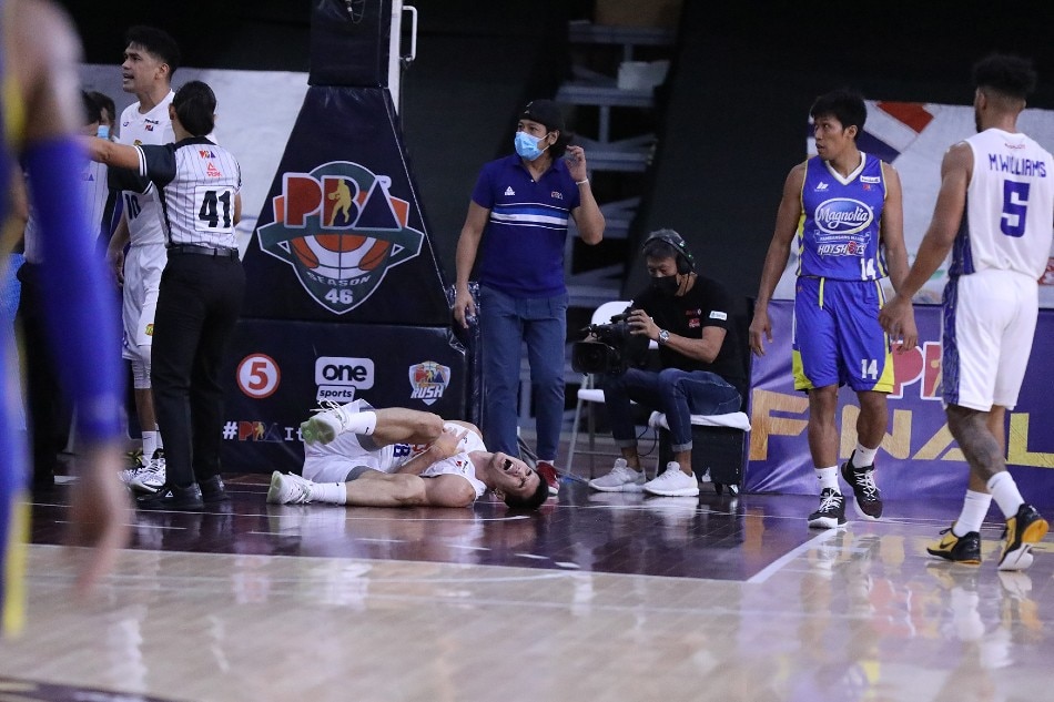 TNT forward Troy Rosario suffered a bad fall in Game 3 of the PBA Philippine Cup Finals. PBA Media Bureau.