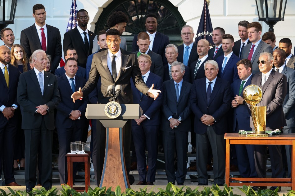 Giannis Antetokounmpo of the Milwaukee Bucks speaks at the podium as U.S. President Joe Biden welcomes the Milwaukee Bucks to the South Lawn of the White House to honor the team for its NBA Championship. Scott Taetsch, USA TODAY Sports/Reuters.