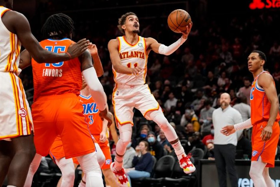 Atlanta Hawks guard Trae Young (11) drives to the basket against the Oklahoma City Thunder during the second half at State Farm Arena. Dale Zanine-USA TODAY Sports via Reuters