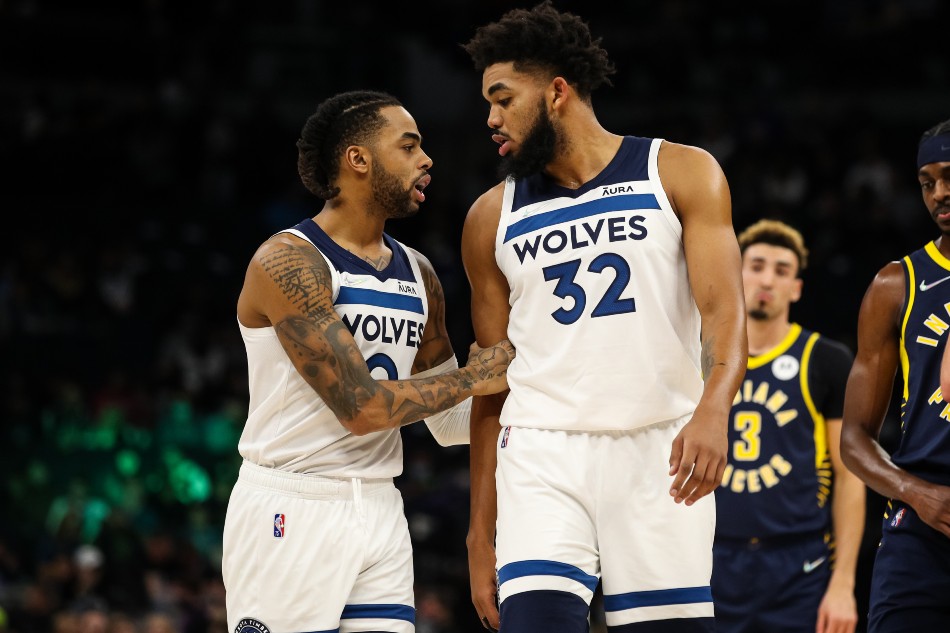 Minnesota Timberwolves guard D'Angelo Russell (0) talks to center Karl-Anthony Towns (32) in the first quarter against the Indiana Pacers in the first quarter at Target Center. David Berding, USA TODAY Sports/Reuters.