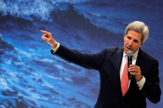 US 'proud to be back' in climate fight, Kerry tells leaders