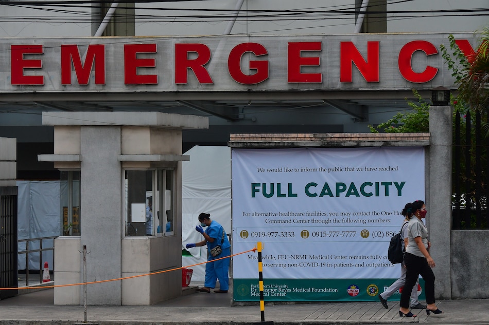 &#39;Full capacity everywhere&#39;: Manila hospitals struggle as virus surges 1