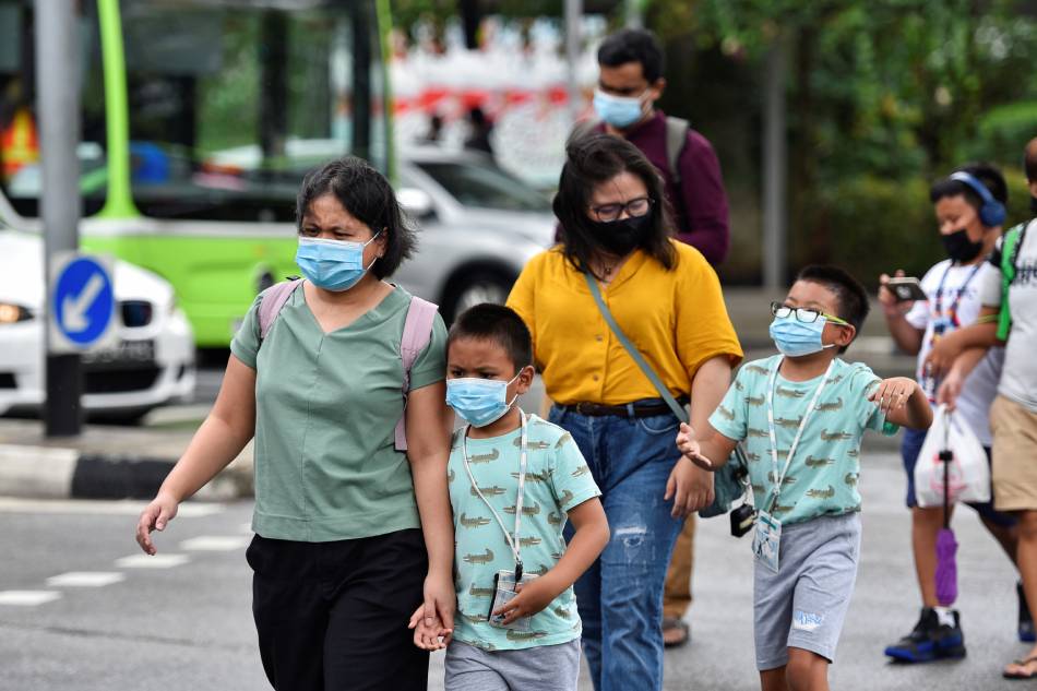 Singapore to shut schools as coronavirus cases rise 1