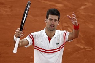 Tennis: Djokovic conquers 'Everest' and eyes 52-year landmark at French Open