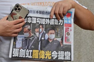 Hong Kong pro-democracy media executives appear in court