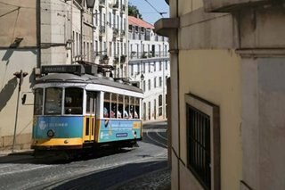 Portugal back under partial curfew as virus cases surge