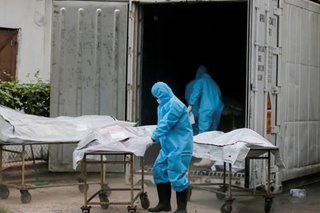 Sri Lanka holds mass cremations as COVID cases surge