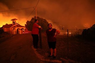 Wildfires burn outside Athens; villages evacuated