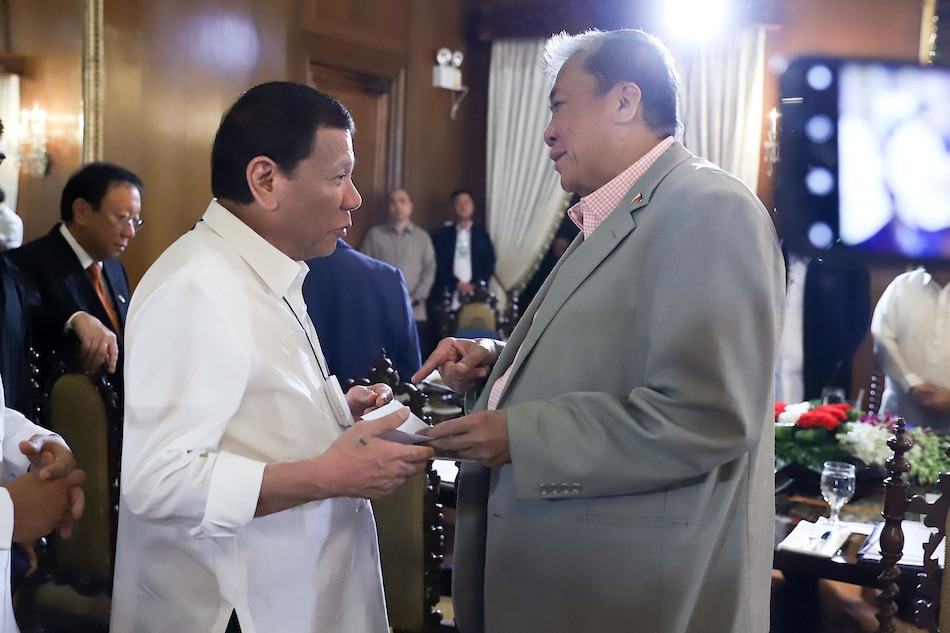 President Rodrigo Roa Duterte chats with Transportation Secretary Arthur Tugade prior to the start of the 46th Cabinet Meeting at the Malacañan Palace on March 2, 2020. Rey Baniquet, Presidential Photo