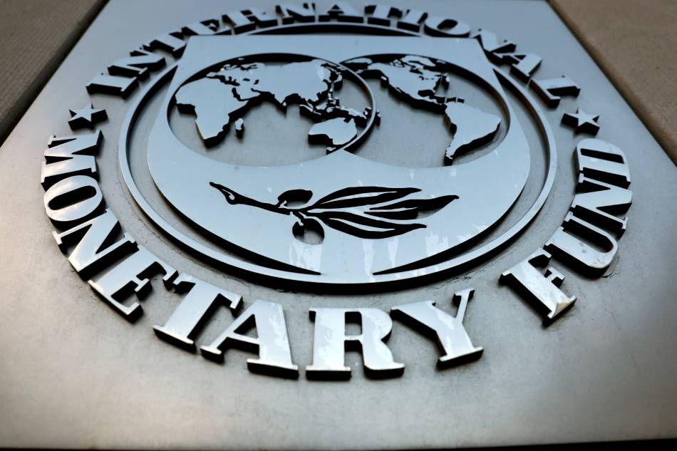 The International Monetary Fund (IMF) logo is seen outside the headquarters building in Washington, U.S., September 4, 2018. Yuri Gripas, Reuters/File Photo