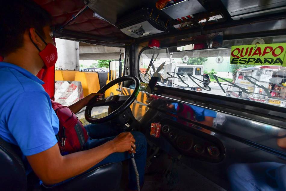 Jeepneys plying the Quiapo-Project 8 route traverse EDSA in Quezon City, making a u-turn under the EDSA-Quezon Avenue flyover on October 27, 2020. Mark Demayo, ABS-CBN News